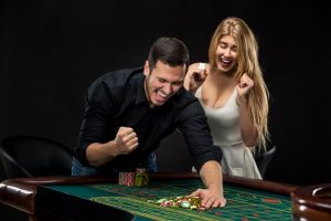 playing roulette girl and boy