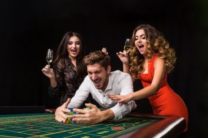 playing roulette girls and man