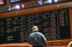 Sports bets on a big board